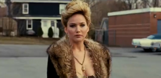 Illustration for article titled Christian Bale + Jennifer Lawrence + 70s Sleaze = American Hustle